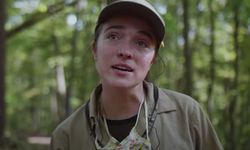 Eleanor Trott of Appalachian conservation corps with a forest in the background
