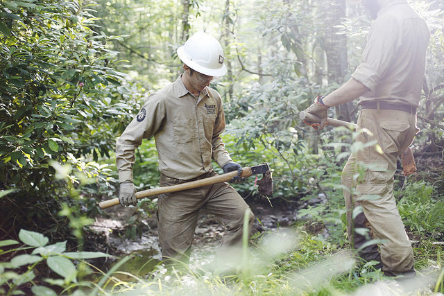 Crew Members working with trail tools